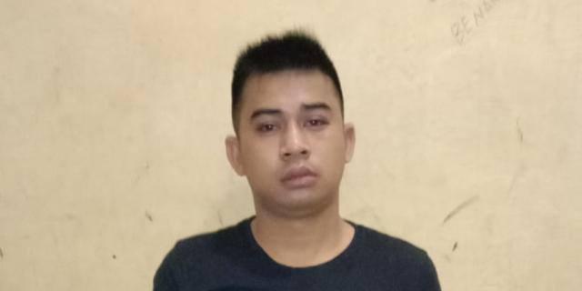 Pelaku saat diamankan di kantor Polisi 