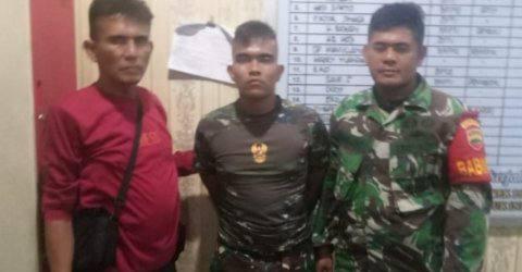 Pelaku saat diamankan Prajurit TNI 
