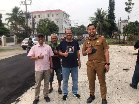 Pengaspalan jalan Danau Marsabut