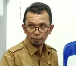 Kepala Bidang Usaha Ekonomi Masyarakat (UEM) Dinas Pemberdayaan Masyarakat dan Desa (PMD) Tapanuli Tengah, Manuturi Siregar (kanan).