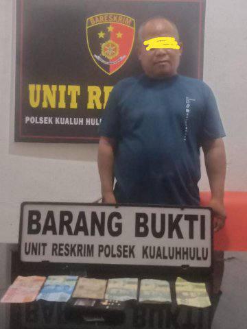 Pelaku dan barang bukti saat diamankan 