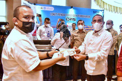 Peluncuran pembayaran pajak kendaraan bermotor menggunakan QRIS di Hotel Grand Mercure Maha Cipta Medan Angkasa, Jalan Sutomo Nomor 1, Medan, Senin (13/6/2022).