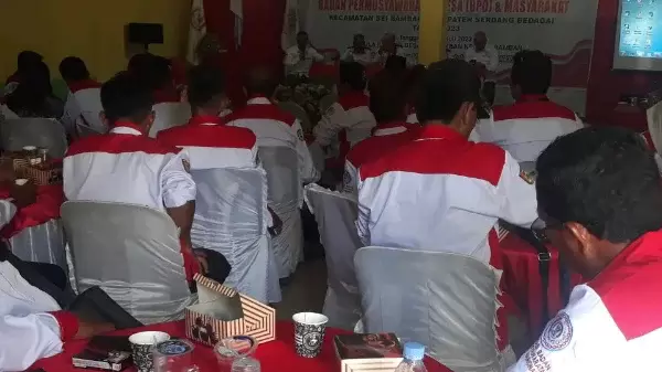 Suasana kegiatan di aula kantor desa Sei Bamban