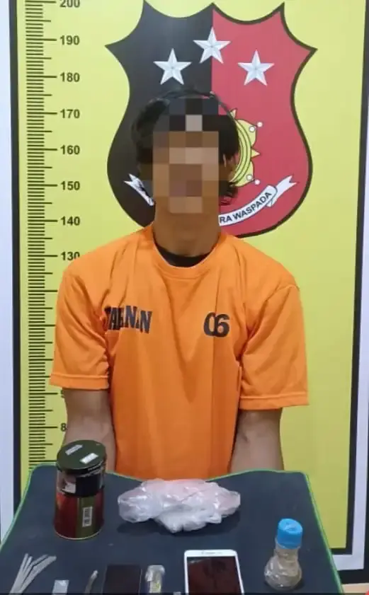 Pelaku saat diamankan 