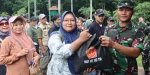 TNI Bagikan 15 Ribu Paket Sembako untuk Masyarakat di Monas
